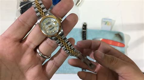 rolex watch opening directions